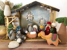 crocheted nativity scene displayed on wooden table