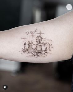 a person with a small tattoo on their arm