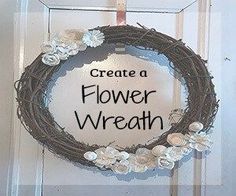 a wreath that says create a flower wreath hanging on a door with the words, create a flower wreath