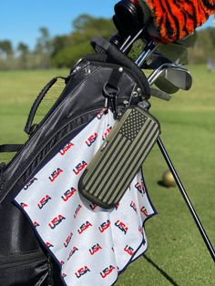 a golf bag with an american flag on it and a putter's club