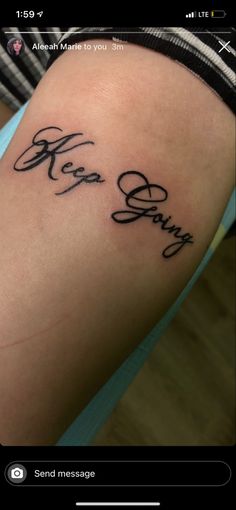 a person with a tattoo on their arm that says, kea sayy send message