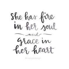 the words she has fire in her soul and grace in her heart on white paper