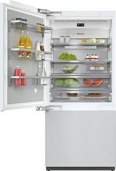 an open refrigerator with food and drinks in it