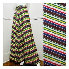 1970s vintage wool chevron serape striped maxi skirt. Cozy wool in ivory with brown, red, blue, yellow and green chevron stripes. High waistband with belt loops. Matching tie belt at the waist. A-line silhouette. Ankle length. Button and zipper at the back. No lining.  { LABEL- FABRIC- TAG SIZE } No makers label Wool No size tags { MEASUREMENTS } Shown clipped on a 5'8" Mannequin with 33" Bust- 25" Waist- 35" Hips  NO STRETCH Waist- 28" Hips- 44" Length- 45" { CONDITION } Excellent Condition PLE Stripe Maxi Skirt, Maxi Rock, Striped Maxi Skirt, Green Chevron, Striped Maxi Skirts, Chevron Stripe, Striped Maxi, Fabric Tags, Vintage Wool