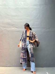 ☎️  make sure to provide your phone number for the shipping to complete ☎️ Bali Tie-dyed Kimono long jacket,  It's made by Bali's traditional -dyed  Perfect for summer fashion, with shorts and a tank top or over a summer dress. At home wear  If you are very small this may be too big.  Stylepark1 Model  -Her height is 175Cm/5.74ft weight is 64kg/141.09Ib /American size, she wore  ~ M to large size.  Made from soft Rayon   Wash Hand cool wash At first, you may smell the unique dye. It will disappe Casual Long Sleeve Kimono With Natural Dye, Beach Outerwear With Relaxed Fit And Long Sleeves, Relaxed Fit Long Sleeve Beach Outerwear, Casual Cotton Kimono With Natural Dye, Relaxed Fit Open Front Outerwear For Beach, Long Hippie Style Beach Outerwear, Long Hippie Outerwear For Beach, Hippie Long Outerwear For Beach, Long Hippie Beach Outerwear