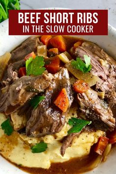 beef short ribs in the slow cooker on top of mashed potatoes and carrots