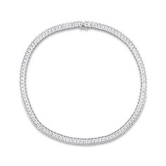 With an endless row of baguette-cut white lab-created sapphires, this shimmering tennis necklace makes a bold statement of style. Crafted in sterling silver This look glistens with 6.0 x 4.0mm baguette-cut white lab-created sapphires. This 18.0-inch necklace secures with a tongue and groove clasp. Diamond White Baguette Cubic Zirconia Tennis Necklace, Diamond White Cubic Zirconia Tennis Necklace With Baguette Diamonds, Formal Diamond White Tennis Necklace With Baguette Diamonds, Silver Baguette Cut Classic Tennis Necklace, Formal Diamond White Baguette Diamonds Tennis Necklace, Classic Silver Baguette Cut Tennis Necklace, White Baguette Cut Diamond Necklace, White Gold Tennis Necklace With Baguette Diamonds For Anniversary, Anniversary White Gold Tennis Necklace With Baguette Diamonds