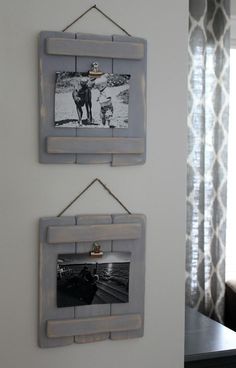 two framed pictures hang on the wall next to each other, one with a dog and another with a cat