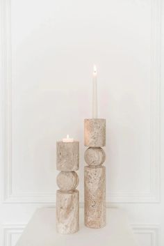 three candles are stacked on top of each other