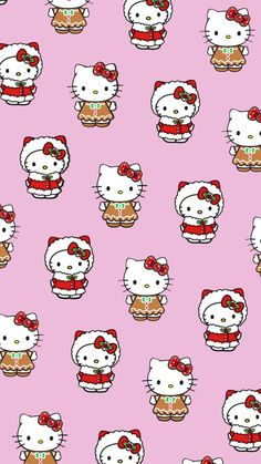 the hello kitty wallpaper is pink and has red bows on it