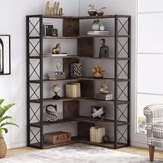 an open bookcase in the corner of a room next to a chair and potted plant