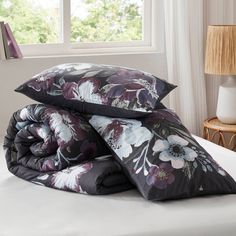 two pillows are stacked on top of each other