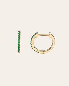 Classic and timeless handcrafted pave emerald huggies earrings set in 14k solid yellow gold. Uber chic, wear them day or night, up or down. (Sold as a pair). Emerald Carat Weight: Approx. 0.08ctw Outer Diameter: Approx. 12mm Inner Diameter: Approx. 8mm Ships in 3-5 business days Rush orders ship in 1-2 business days This item is Final Sale Comes gift ready in a beautiful, custom Zoe Lev jewelry box. Emerald Huggie Earrings, Emerald Hoop Earrings, Green 14k Gold Huggie Earrings Gift, 14k Gold Green Jewelry With Pave Setting, Green 14k Gold Jewelry With Pave Setting, Emerald Huggie Earrings For May Birthstone, Yellow Gold Emerald Huggie Earrings, Green Small Hoop Huggie Earrings Fine Jewelry, Green Huggie Fine Jewelry Earrings