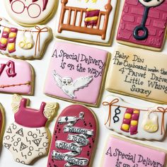 decorated cookies are arranged in the shape of baby's first birthdays and other items