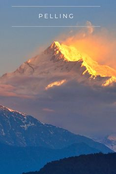 the top of a snow covered mountain with text overlaying it that reads pelling