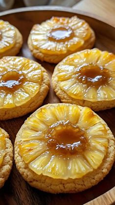 pineapple cookies with caramel filling on a wooden platter, ready to be eaten