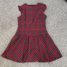 Women’s Red Plaid Dress. Never Worn. Size Large. Prob Fits Like An 8. Drop Waist. Zipper In The Back. Ruffle Detail On The Sleeve. Matching Girls Dress Also Listed. Red Fitted Plaid Casual Dress, Casual Fitted Red Plaid Dress, Casual Red Fitted Plaid Dress, Sleeveless Plaid Dress For Party, Casual Plaid Dress For Parties, Red Fitted Plaid Dress With Short Sleeves, Fitted Red Plaid Dress With Short Sleeves, Casual Plaid Holiday Dress, Red Casual Holiday Dress