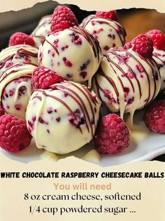 raspberry cheesecake balls on a plate with white chocolate drizzled