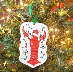 a christmas ornament hanging from a tree