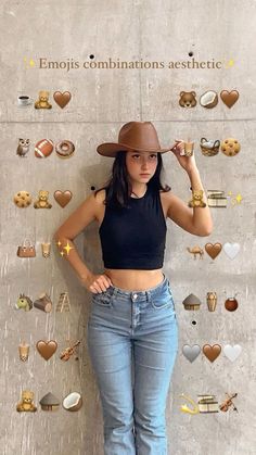 a woman standing in front of a wall with lots of stickers on it's side