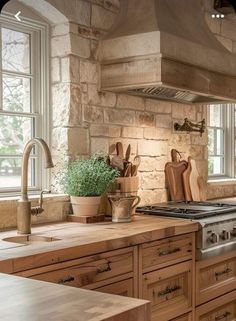 a kitchen with an oven, sink and counter tops in it's center island