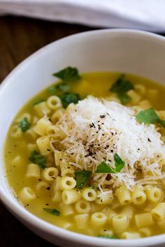 pasta with chicken broth, butter and parmesan cheese in a white bowl