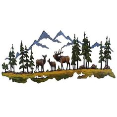 a metal sculpture of some animals in the woods with mountains in the backgroud