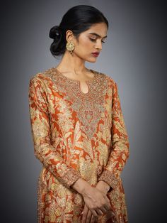 Editor's Note Make a statement with our rust and beige zardozi heavy hand-embroidered chameli kurta, paired with palazzo pants and a matching dupatta. This ensemble exudes opulence and elegance, perfect for special occasions and celebrations. The intricate zardozi handwork in rich rust and beige tones adds a touch of grandeur, while the comfortable palazzo pants complete the look with style and grace. Elevate your ethnic fashion game with this exquisite outfit that combines tradition and contemp Ritu Kumar, Pakistani Wedding Outfits, Beige Silk, Ancient Designs, Hand Work Embroidery, Silk Embroidery, Kurta Designs, Style And Grace, Kurta Set