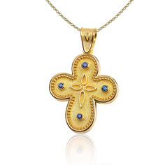 "The beauty of Byzantine style jewelry, completely handcrafted in Greece with the old-fashioned way, is omnipresent. An outstanding solid yellow gold cross with Byzantine design decorated with genuine gemstones, remains a classic and elegant choice for everyone. Bold and traditional, you will not take your eyes off. Neither will your friends! High Quality Handmade Greek jewelry! ✔ Dimensions: Inches: 1 X 0.65 inch ✔ Dimensions: Millimetres: 26 x 16.5 mm ✔ High quality product. ✔ In a gift box ✔ Handmade Gold Jewelry For Baptism, Byzantine Cross Jewelry For Ceremonial Occasions, Byzantine Style Cross Jewelry In Yellow Gold, Byzantine Style Yellow Gold Cross Jewelry, Byzantine Cross Jewelry, Yellow Gold Byzantine Cross Jewelry, Byzantine Yellow Gold Cross Jewelry, Byzantine Yellow Gold Cross Necklaces, Byzantine Style Yellow Gold Cross Pendant Jewelry