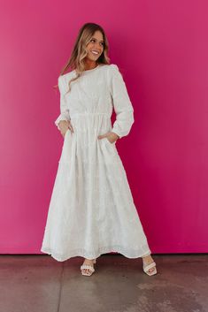 Stay sweet and cute in THE WINNEE MAXI EYELET DRESS. With a charming eyelet design and convenient pockets, this long sleeve dress is perfect for any occasion. Embrace the pure white color and effortlessly stand out in style. Long Sleeve Eyelet Temple Friendly Maxi length Pockets Self: 100% rayon, Lining: 100% polyester Dress is true to size. Small (0-2), Medium (4-6), Large (8-10), X-Large (10-12). Length (shoulder to hem): Small: 55.5", Medium: 56", Large: 56.5", X-Large: 57". Model is 5'5" wea Temple Dresses For Women, White Temple Dress, Long Sleeve White Maxi Dress, Lds Temple Dresses, Lds Temple Dress, Temple Dresses, White Dress Winter, Temple Dress, The Pure