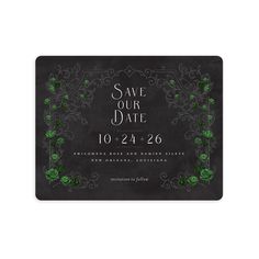 save the date card with green roses and leaves on a black slate background, in an ornate frame