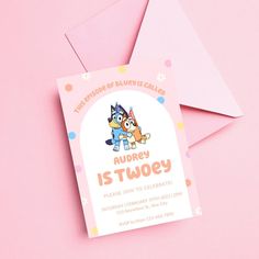 a pink birthday card with an image of two cartoon characters on it