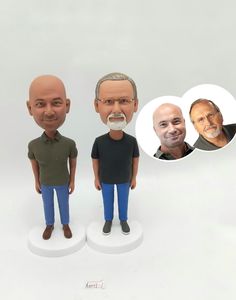 three bobble heads with two men on them