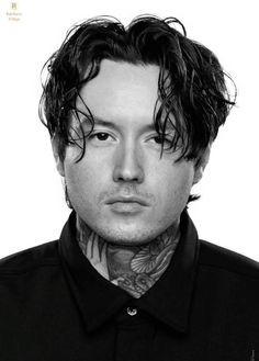 a black and white photo of a man with tattoos on his neck, wearing a shirt