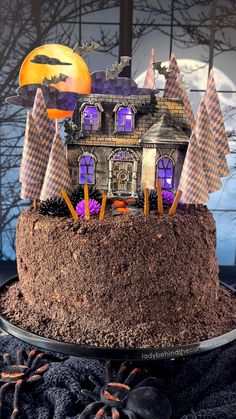 a halloween cake with decorations on top