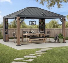 a gazebo sitting on top of a lush green field