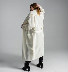 White cardigan Light coat Oversized cardigan Chunky sweater Basic clothing Chunky loose knitwear Long coat Minimal clothing Kimono cardiganOne size fits for XS-M/LFree shipping worldwideThis item can be made in any size and color (1-2 weeks for production). Contact us, and we will advice about color availability and measures required. The wool is machine washable with program of "wool" or "delicate" Low temp. 30°Designed & Created by Gurenkova Knitwear Oversized Long Outerwear In Winter White, Oversized Long Cozy Outerwear, Oversized Winter White Sweater Coat With Long Sleeves, Oversized Winter White Cardigan For Winter, Cozy Oversized Long Outerwear, Oversized Beige Shawl Collar Outerwear, Oversized Long Chunky Knit Outerwear, Oversized Chunky Knit Long Outerwear, Chic Chunky Knit Sweater Coat For Winter