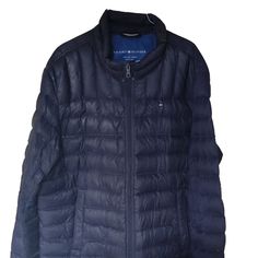 Prepare For The Cold In Style With This Extra Large Tommy Hilfiger Natural Down Navy Packable Puffer Jacket! This Sleek And Warm Jacket Is Perfect For Chilly Days And Nights. Here's Why You'll Love It: - Premium Natural Down Filling: Stay Toasty Warm Thanks To The 100% Natural Down Filling. - Packable Design: Fold It Up Easily And Store It In Your Bag Or Backpack For Effortless Portability. - Navy Blue Color: This Versatile Color Will Match Any Outfit. - Sleek And Stylish Design: Features A Clas Tommy Hilfiger Fall Outdoor Outerwear, Winter Tommy Hilfiger Outerwear With Pockets, Tommy Hilfiger Winter Outerwear With Pockets, Tommy Hilfiger Blue Outerwear For Fall, Casual Tommy Hilfiger Winter Outerwear, Tommy Hilfiger Casual Winter Outerwear, Tommy Hilfiger Long Sleeve Winter Outerwear, Tommy Hilfiger Spring Outdoor Outerwear, Tommy Hilfiger Long Sleeve Outerwear For Cold Weather