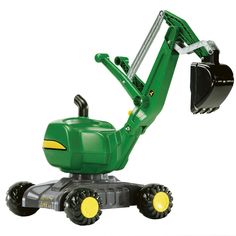 a toy tractor with a shovel attached to it's back end, on a white background