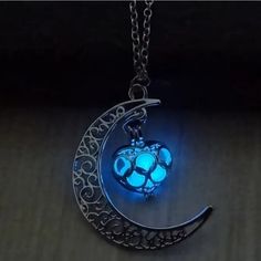 Moonstone Decor Hollow Moon Pendant Necklace Luminous Pendant Glows Sky Blue Blue Mystical Necklace With Moon Charm, Adjustable Blue Luminous Jewelry, Adjustable Luminous Blue Jewelry, Blue Mystical Moon Charm Jewelry, Mystical Blue Moon Charm Jewelry, Mystical Blue Moon Phase Necklace, Magical Luminous Blue Jewelry, Blue Luminous Jewelry For Party, Luminous Blue Jewelry For Parties