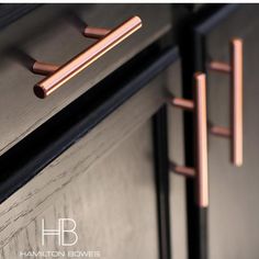 a close up view of the handles on a cabinet