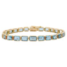 For Sale on 1stDibs - Aquamarine bracelet in 18K Gold. It has a perfect octagon cut gemstone to make you stand out on any occasion or an event. A tennis bracelet is an essential Aquamarine Bracelet, Aquamarine Stone, Fabulous Jewelry, D Day, Tennis Bracelet, Italian Charm Bracelet, Solid Yellow, Gemstone Bracelet, Stone Bracelet