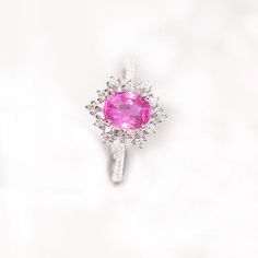 *Condition: Brand new *Center Stone: Natural Pink Peach Sapphire, Cushion Cut, approx 1.54ct *Side stones: Natural white diamond round-cut (VS1 clarity and F color) *Ring Weight: 2.65ct *Metal Purity: Can be select Each piece is made-to-order with care and special attention to detail. all items are made with conflict-free diamonds and gems. Size: made to order The item will be gift wrapped and shipped. ------------------------------------------------------------------- Available in : 14k Rose or Luxury Pink Oval Cluster Ring, Pink Oval Diamond Ring With Dazzling Style, Dazzling Pink Oval Diamond Ring, Pink Oval Cluster Ring With Center Stone, Pink Oval Cluster Ring Fine Jewelry, Luxury Pink Oval Halo Ring, Elegant Pink Cluster Rings, Oval Pink Sapphire White Gold Jewelry, Oval Pink Sapphire Diamond Ring In White Gold