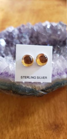 *Citrine *Nickel Free*Sterling Silver *Free Shipping *Handcrafted In USA*Jewelry ship in Gift box These jewelry are created by hand , measuring, soldering , buffing and setting cabochons on the concho base. All components except for the cabochons are solid .925 silver.We're also have matching Necklace in the shop.Thank You For Your Looking ,And Check Out More Items In My Etsy Shop For More Great Deals, Also We Add More Jewelry To Etsy Shop Regularly https://www.etsy.com/shop/ABQdesign Citrine Earrings Studs, Usa Jewelry, Citrine Earrings, Natural Citrine, Matching Necklaces, Sterling Silver Earrings Studs, Soldering, Stud Earring, Resin Jewelry