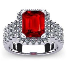 METAL SPECIFICATIONS Metal Name: White Gold 14K STONE SPECIFICATIONS Stone Name: RUBY/DIAMOND Stone Cut : Emerald & Round cut Stone Specifications: There is one red ruby in the center of approx. 5.00 carats & approx. 2.50 carats smaller diamonds on the side. Natural earth mined stones. Total Stone Weight : approx. 7.50 carats Color : Red/F Clarity : AAA/VS1 RING SPECIFICATIONS Appraised Value : $15000.00 Comes with a FREE APPRAISAL Ring Size : 6.5 (Can ship in any size you want) All kind of cust Diamond Ring Gold, Ruby Diamond, Red Ruby, Natural Earth, Stone Cuts, Gold Diamond Rings, Ring Gold, Diamond Stone, Round Cut