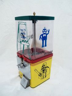 an old fashioned ice cream dispenser with cartoon drawings on the front and sides