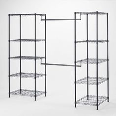 two metal shelvings with four shelves on each side and one shelf below them