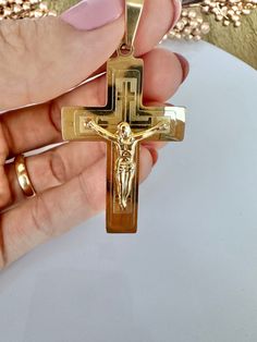 Add a touch of elegance and devotion to your jewelry collection with this beautiful Gold Plated Christian Crucifix Jesus Cross pendant. Expertly crafted from high-quality stainless steel, this pendant is plated with a radiant layer of gold, enhancing its visual appeal and making it a standout piece. The pendant features a finely detailed depiction of Jesus Christ crucified, capturing the profound symbolism of his sacrifice and love. The intricate craftsmanship includes the outstretched arms of J Gold Stainless Steel Crucifix Jewelry, Jesus Christ Crucified, Christ Crucified, Jesus Cross, Jesus Christus, Jesus On The Cross, Prayer Cards, Stainless Steel Pendant, Bosnia And Herzegovina