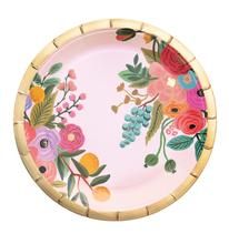 a pink plate with flowers painted on it