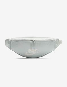 Nike Heritage Waist Pack. A Comfortable And Easy To Adjust Strap Makes The Nike Heritage Waist Pack A No Brainer For Everyday Trips. The Main Compartment Provides Secure Storage For Your Phone, Snacks Or Wallet While The Smaller Accessories Pocket On The Backside Helps Keep Things Like Your Keys, Travel Info Safe And Close At Hand. The Buckle Snaps Together In The Middle Of The Strap For A Comfortable, Easy-To-Adjust Fit. The Bag Can Be Worn At Your Waist, Across Your Body Or Over Your Shoulder. Nike Essential Sling Bag Beige, Nike Sling Bag Beige, Nike Beige Sling Bag, Nike Sportswear Essential Bag, Reworked Nike Bag, Nike Sling Bag Brown, Nike Essentials Sling Bag, Nike Hip Pack, Hip Pack